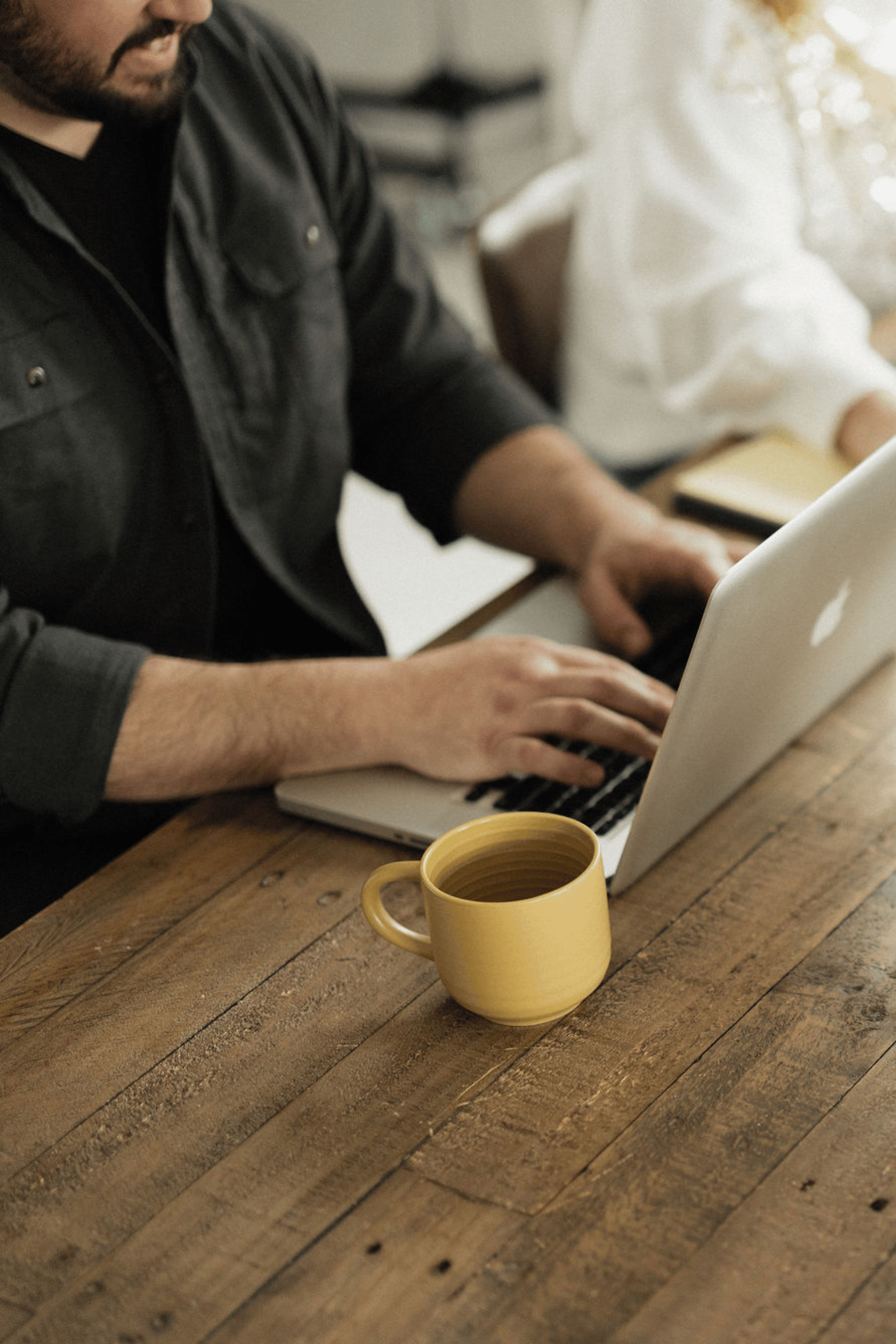 man working at laptop